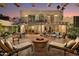 Spacious backyard patio with fire pit and seating at 7500 E Mccormick Pkwy # 78, Scottsdale, AZ 85258