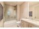 Modern bathroom with a glass shower and floating vanity at 7537 N Lakeside Ln, Paradise Valley, AZ 85253