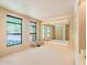 Spacious yoga room with large mirror and natural light at 7537 N Lakeside Ln, Paradise Valley, AZ 85253