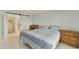 Spacious bedroom with a dresser and barn door to closet at 7756 E Coralbell Ave, Mesa, AZ 85208