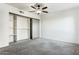 Bedroom with mirrored closet and neutral carpeting at 7777 E Main St # 228, Scottsdale, AZ 85251