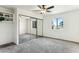 Bright bedroom with mirrored closet doors and neutral carpeting at 7777 E Main St # 228, Scottsdale, AZ 85251