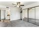 Bedroom with mirrored closet doors and access to bathroom at 7777 E Main St # 228, Scottsdale, AZ 85251