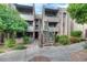 Condo building exterior with stairs and landscaping at 7777 E Main St # 228, Scottsdale, AZ 85251