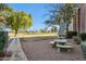 Ground level patio with seating and golf course views at 7777 E Main St # 228, Scottsdale, AZ 85251