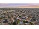 Wide aerial shot of the community and the property, highlighting the neighborhood's layout and amenities at 7804 W Pershing Ave, Peoria, AZ 85381