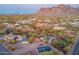 Aerial view of a property with multiple buildings and desert landscape at 831 N Arroya Rd, Apache Junction, AZ 85119