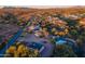 Aerial view of a desert property showing a home and surrounding landscape at 831 N Arroya Rd, Apache Junction, AZ 85119