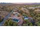 Aerial view of property with multiple buildings and desert landscape, a road is nearby at 831 N Arroya Rd, Apache Junction, AZ 85119