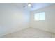 Well-lit bedroom featuring tile floors at 831 N Arroya Rd, Apache Junction, AZ 85119