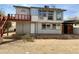 Two story home featuring a walk out deck, a covered parking area and xeriscaping at 831 N Arroya Rd, Apache Junction, AZ 85119