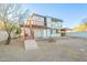 Two-story house with wooden deck and stairs at 831 N Arroya Rd, Apache Junction, AZ 85119