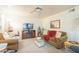 Relaxing living room with comfy seating and a fireplace at 831 N Arroya Rd, Apache Junction, AZ 85119