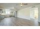 Spacious living room featuring hardwood floors and a ceiling fan at 831 N Arroya Rd, Apache Junction, AZ 85119