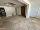 Bright living room featuring stylish tile floors and a fireplace at 831 N Arroya Rd, Apache Junction, AZ 85119