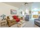 Cozy living room featuring comfortable seating and a ceiling fan at 831 N Arroya Rd, Apache Junction, AZ 85119