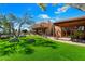 Spacious backyard with a pool and lush landscaping at 8375 E Via Dona Rd, Scottsdale, AZ 85266