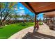 Relaxing patio with a stone floor and pergola at 8375 E Via Dona Rd, Scottsdale, AZ 85266