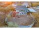 Aerial view of house with deck and surrounding desert landscape at 843 N Arroya Rd, Apache Junction, AZ 85119