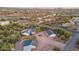 Aerial view of property with multiple buildings and surrounding desert landscape at 843 N Arroya Rd, Apache Junction, AZ 85119