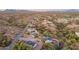 Aerial view of property with multiple buildings and surrounding desert landscape at 843 N Arroya Rd, Apache Junction, AZ 85119