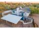 Aerial view of a house with carport and landscaped yard at 843 N Arroya Rd, Apache Junction, AZ 85119