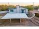 Aerial view of a house with carport and landscaped yard at 843 N Arroya Rd, Apache Junction, AZ 85119