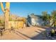 House exterior featuring a carport and desert landscaping at 843 N Arroya Rd, Apache Junction, AZ 85119