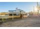 View of the house exterior with carport and surrounding landscape at 843 N Arroya Rd, Apache Junction, AZ 85119