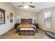 Spacious Primary bedroom with a king-size bed and large windows at 844 W Wagner Dr, Gilbert, AZ 85233