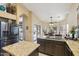 Modern kitchen with granite countertops and stainless steel appliances at 844 W Wagner Dr, Gilbert, AZ 85233