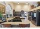 Modern kitchen with granite countertops and stainless steel appliances at 844 W Wagner Dr, Gilbert, AZ 85233