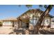 Attractive single-story home with brick facade and covered entryway at 8520 W Palm Ln # 1049, Phoenix, AZ 85037