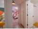 Hallway with view of bedroom and bathroom at 8520 W Palm Ln # 1049, Phoenix, AZ 85037