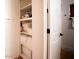 White linen closet with shelves, stacked towels and other items at 8520 W Palm Ln # 1049, Phoenix, AZ 85037