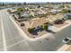 Aerial view of single-story home with large backyard and neighborhood context at 10301 W Cheryl Dr, Sun City, AZ 85351