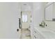 Clean bathroom with white cabinets and a walk-in shower at 10301 W Cheryl Dr, Sun City, AZ 85351