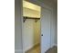 Bright bedroom closet with a hanging rod and shelving at 10301 W Cheryl Dr, Sun City, AZ 85351