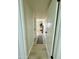 Light and airy hallway with light wood flooring at 10301 W Cheryl Dr, Sun City, AZ 85351