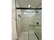 Walk-in shower with hexagon tile floor and modern fixtures at 10301 W Cheryl Dr, Sun City, AZ 85351