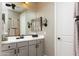 Bathroom with gray vanity, white countertop, and double sinks at 10317 E Tillman Ave, Mesa, AZ 85212