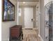 Bright entryway with neutral-toned walls and wood-look tile flooring at 10317 E Tillman Ave, Mesa, AZ 85212