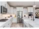 Modern kitchen with stainless steel appliances and white cabinetry at 10317 E Tillman Ave, Mesa, AZ 85212