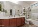 Clean bathroom with a tub, shower, and single vanity at 10496 W Cottontail Ln, Peoria, AZ 85383