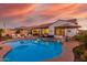 Relaxing pool and spa with sunset view at 10496 W Cottontail Ln, Peoria, AZ 85383