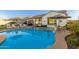 Stunning kidney-shaped pool with a built-in spa at 10496 W Cottontail Ln, Peoria, AZ 85383