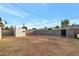 Large backyard with storage shed and space for recreation at 11411 E Crescent Ave, Mesa, AZ 85208