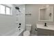 Updated bathroom with a tub and shower combination at 11411 E Crescent Ave, Mesa, AZ 85208