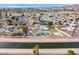 Aerial view of a house near a canal, featuring a spacious backyard and artificial grass at 1152 W Greenway Dr, Tempe, AZ 85282