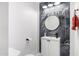 Modern bathroom with marble tile and a sleek glass shower at 1152 W Greenway Dr, Tempe, AZ 85282